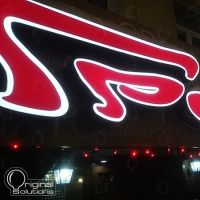 Illuminated signboard with volume elements